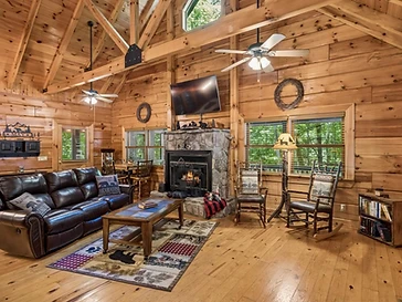 Open-concept living space with high vaulted ceilings