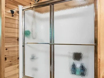 Shower stall with frosted glass door