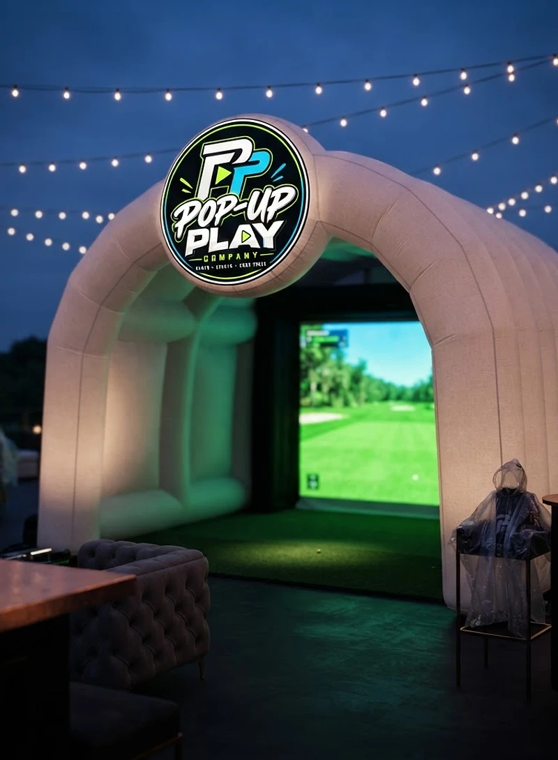 Golf simulator glowing at an evening celebration