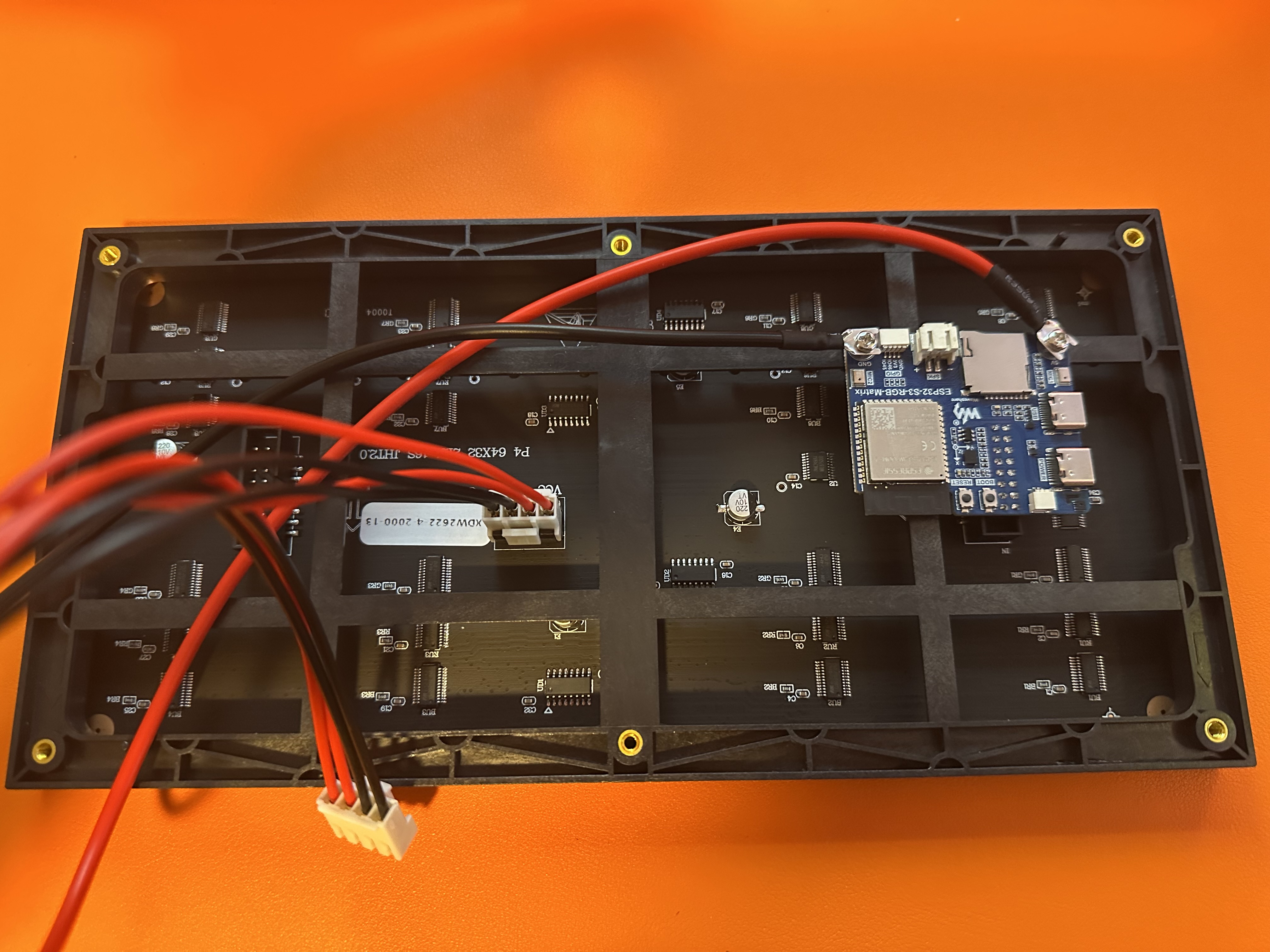 ESP32 board mounted on the rear of the LED matrix panel