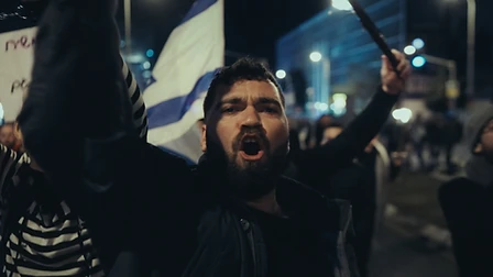 A protester cries out in Kaplan Street, Tel Aviv, during the anti-judicial reform demonstrations.
