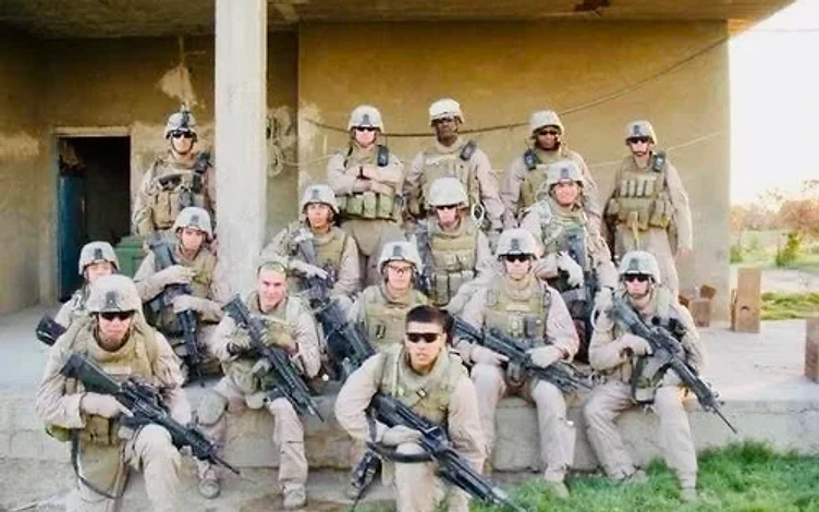 Matthew and his Marine Corps team during deployment