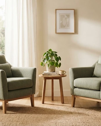 Two calm armchairs in a warm, sunlit room