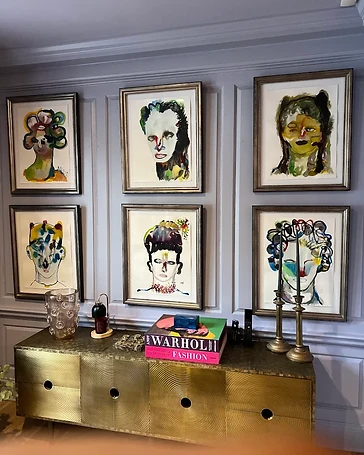 Custom framed artwork and documents from a completed studio commission