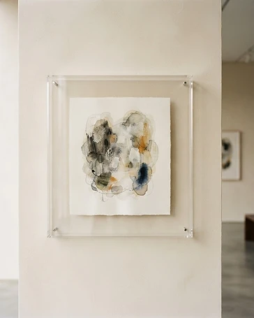 Contemporary artwork presented in a minimal custom acrylic frame