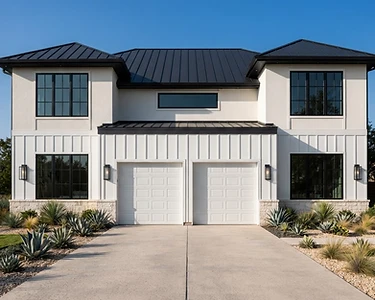 Modern white Texas home with a traditional white sectional garage door, before