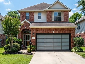 AI-generated garage door preview on a real home
