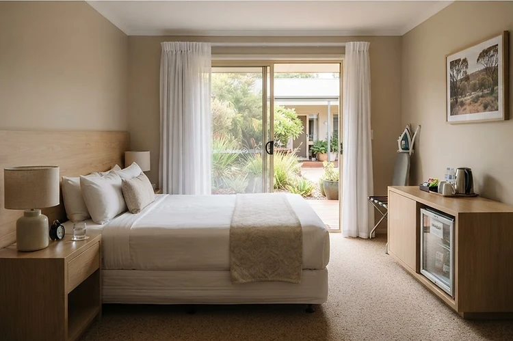 Guests see the room; the pressure usually starts in the corridors behind it.