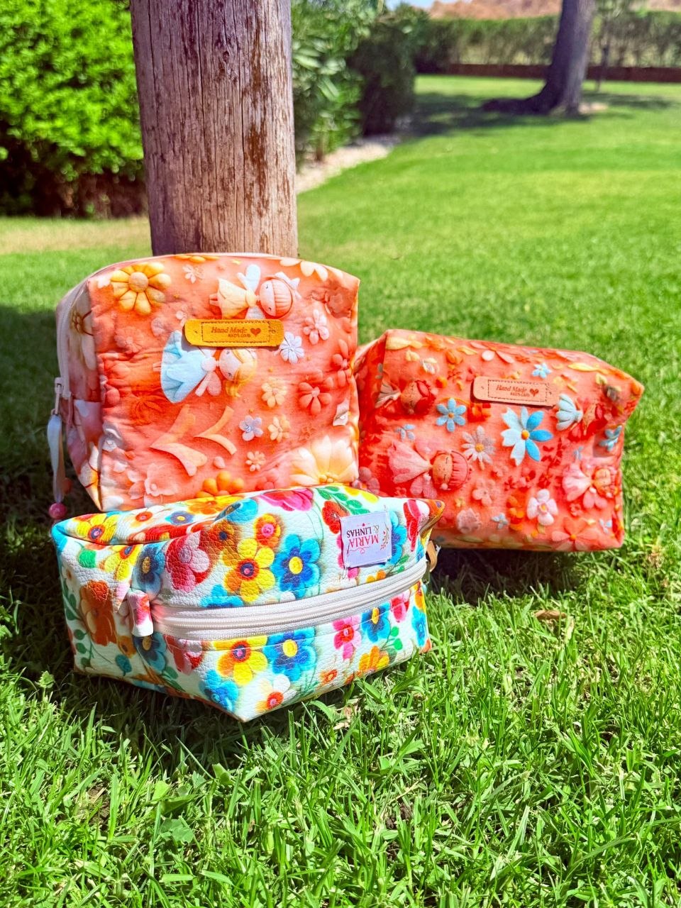 Nécessaires coral com fadas e nécessaires floral