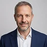 AI-generated professional headshot of the same team member