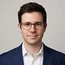 AI-generated professional headshot of the same team member