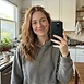 Sales – employee's everyday phone selfie, before the AI headshot session