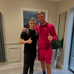 George with a client giving a thumbs up after a treatment at GB Massage Therapy