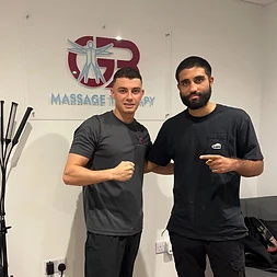 George with a client at the GB Massage Therapy clinic in Fort Dunlop