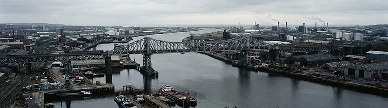 The River Wear in Sunderland with a steel bridge under overcast light