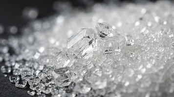 Macro photograph of premium refined white crystalline beet sugar crystals