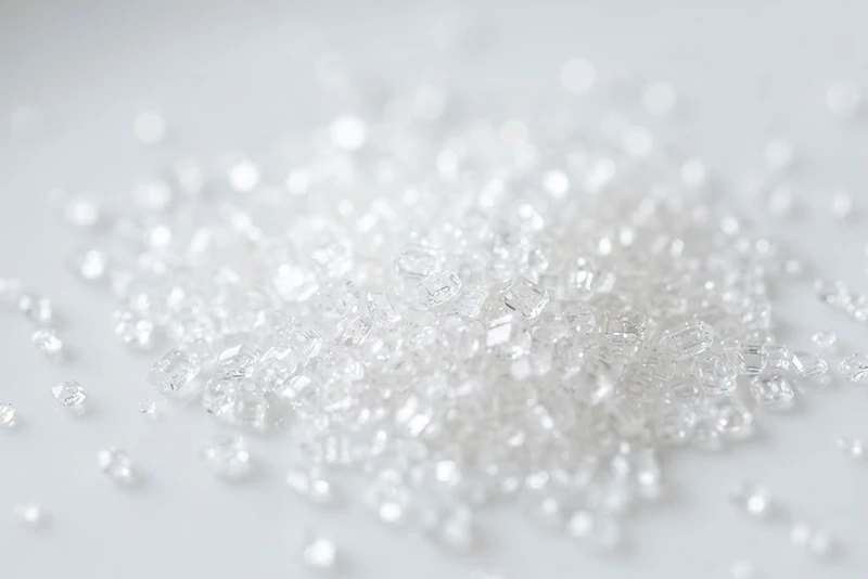 Macro photograph of sparkling brilliant white refined cane sugar ICUMSA 45 crystals