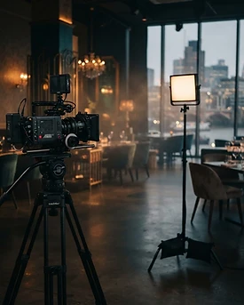 Professional camera and lighting setup in a premium London event space