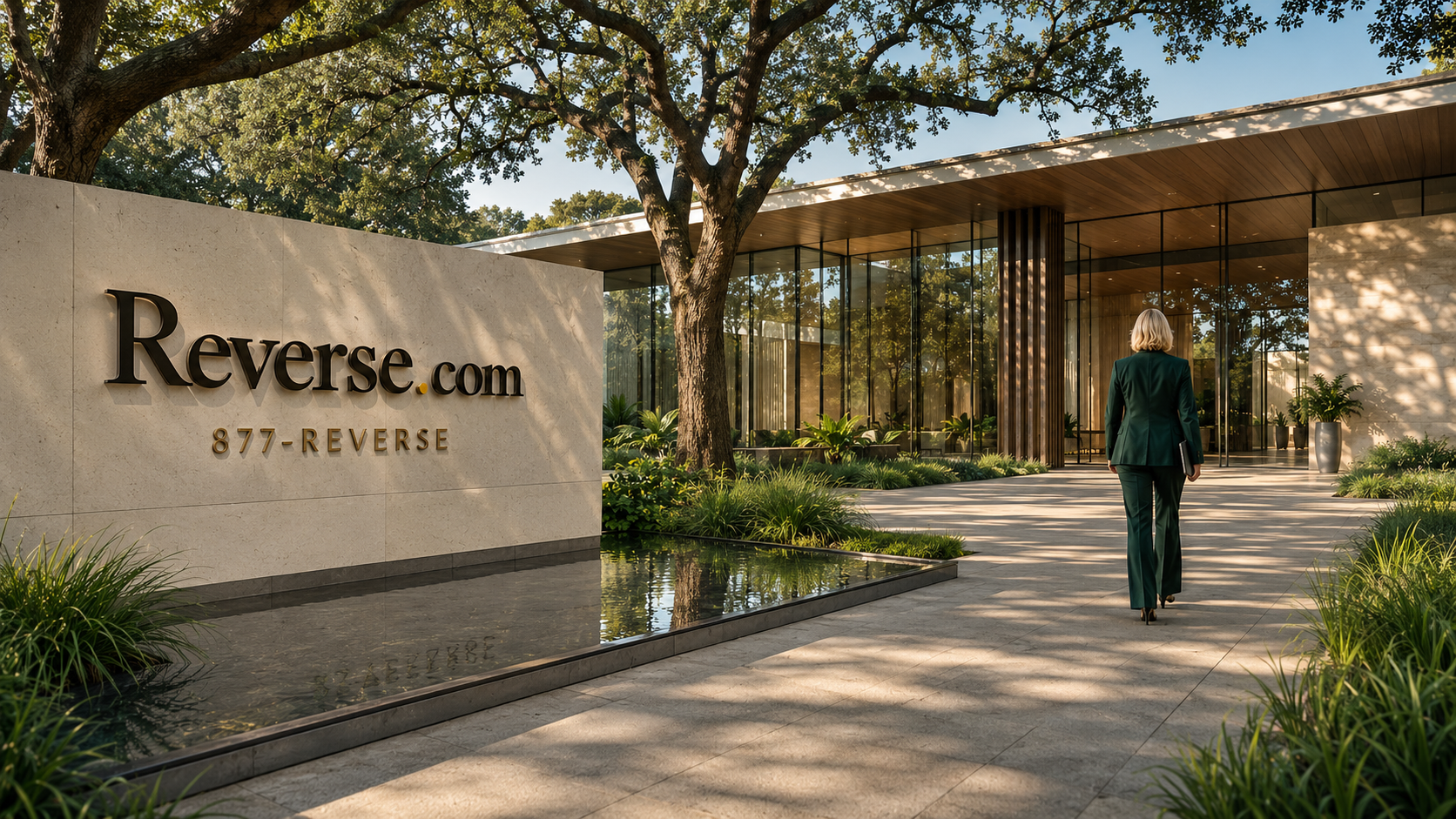 A Reverse.com professional approaching a sunlit corporate entrance past a stone feature wall