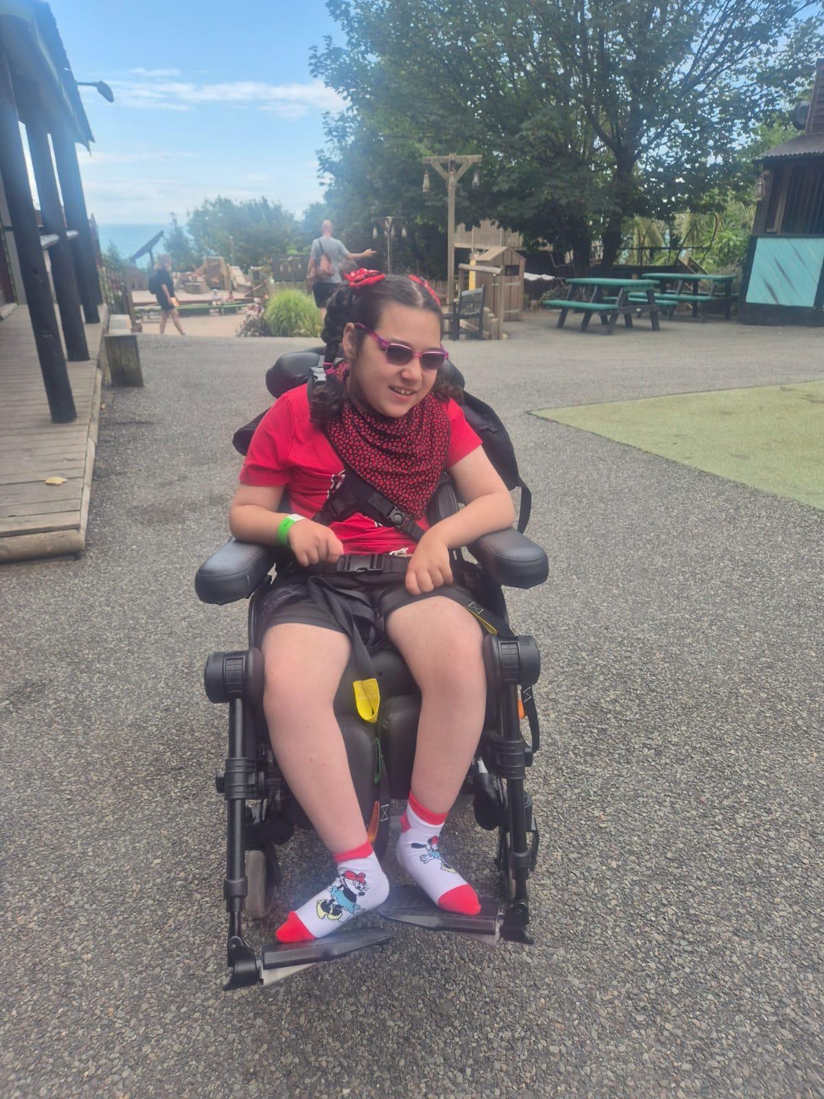 A young traveller in her wheelchair on a Jumbulance adventure