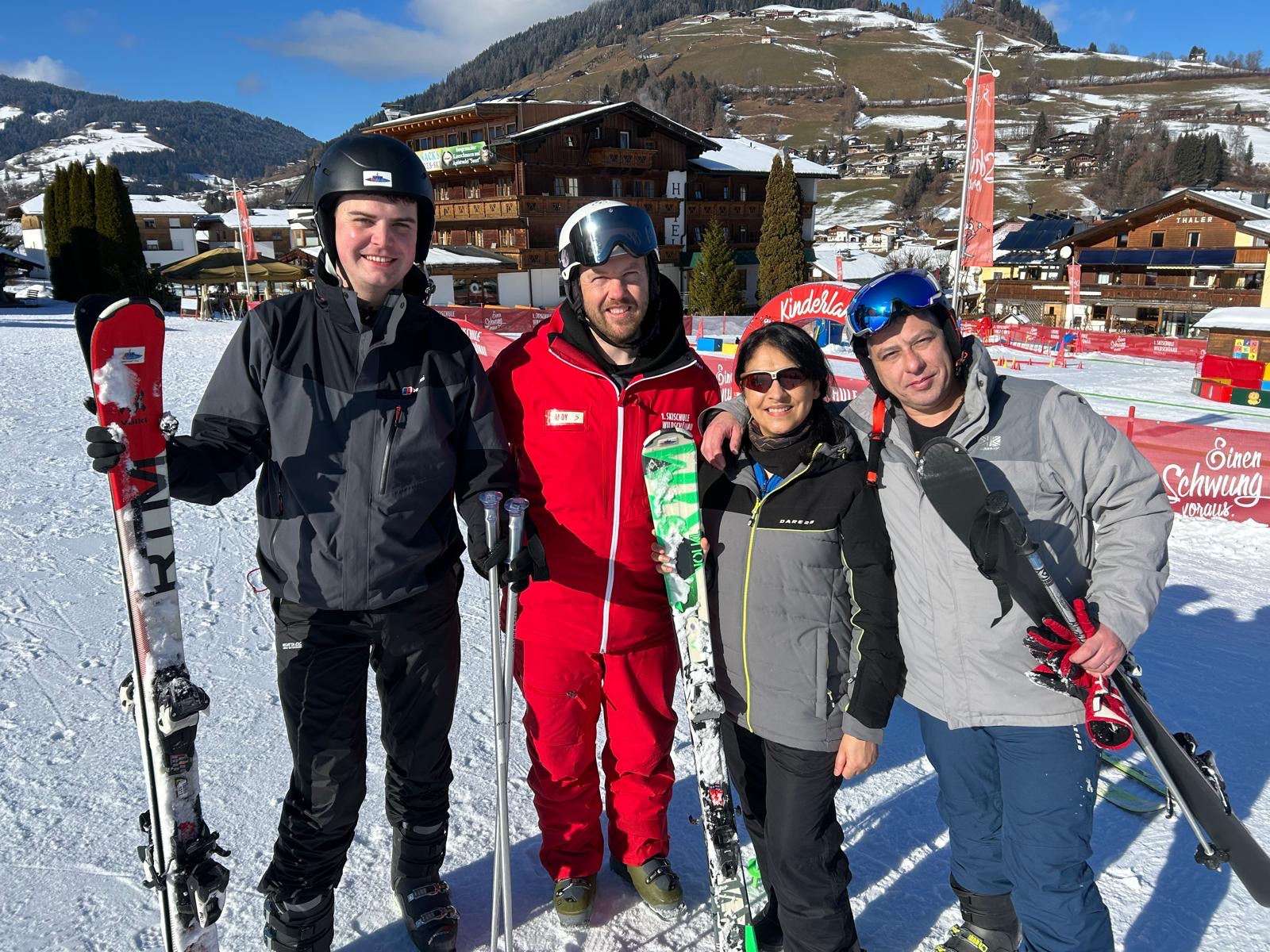 Volunteers and travellers on a ski trip