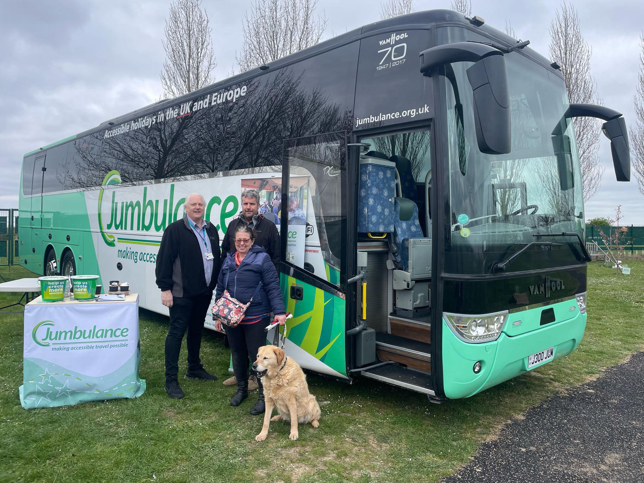 The Jumbulance coach on display at a fundraising event with volunteers