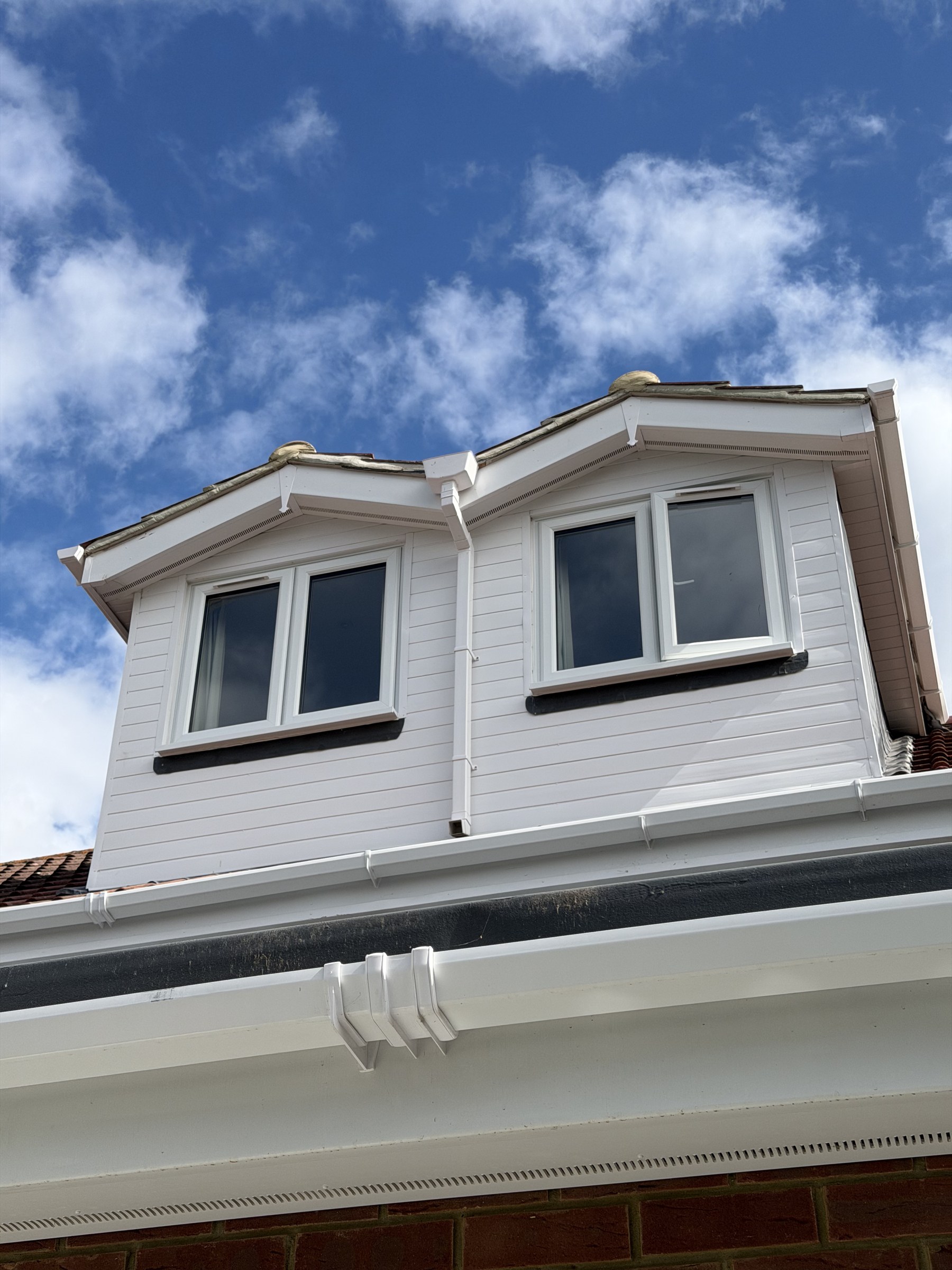 Dormer loft conversion at 37 Bishopfox Way, Lamont Builds