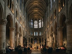 Gothic cathedral interior with stone arches and stained glass