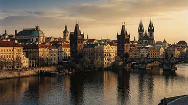 European cityscape blending Gothic spires and classical facades at golden hour