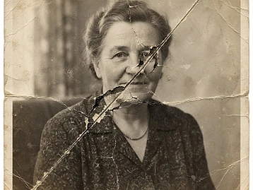 Before photo restoration — Deep fold creases smoothed flat — every wrinkle lifted away.