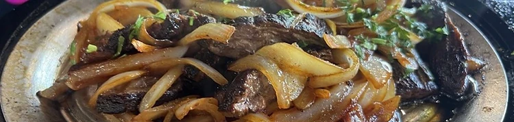 Sizzling fajita platter fresh off the grill