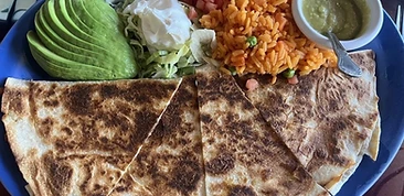 Grilled quesadilla with rice, beans, and guacamole
