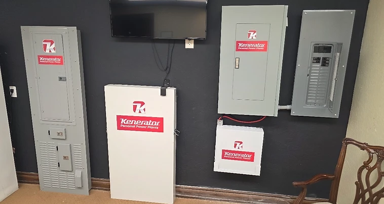 Kenerator Battery cabinet and Kenerator power panels mounted on a wall in a real home installation