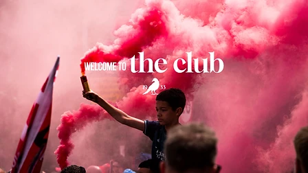 Boy on shoulders releasing a red flare โ Welcome to the club