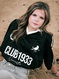Woman in the Club 1933 jersey, high-angle slanted frame
