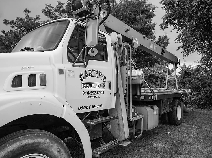 Blue boom truck