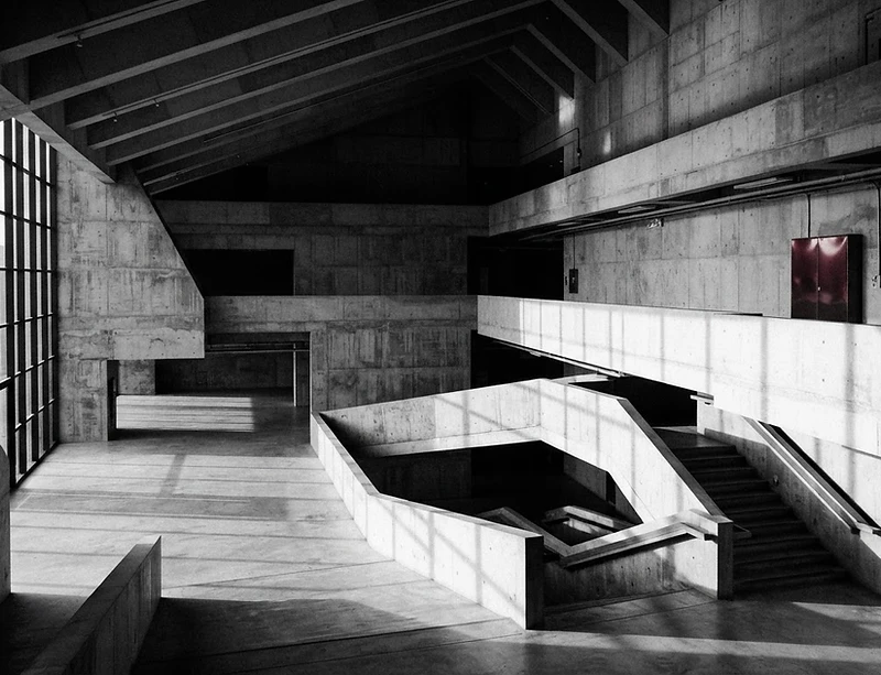 Modern brutalist architecture in late afternoon light