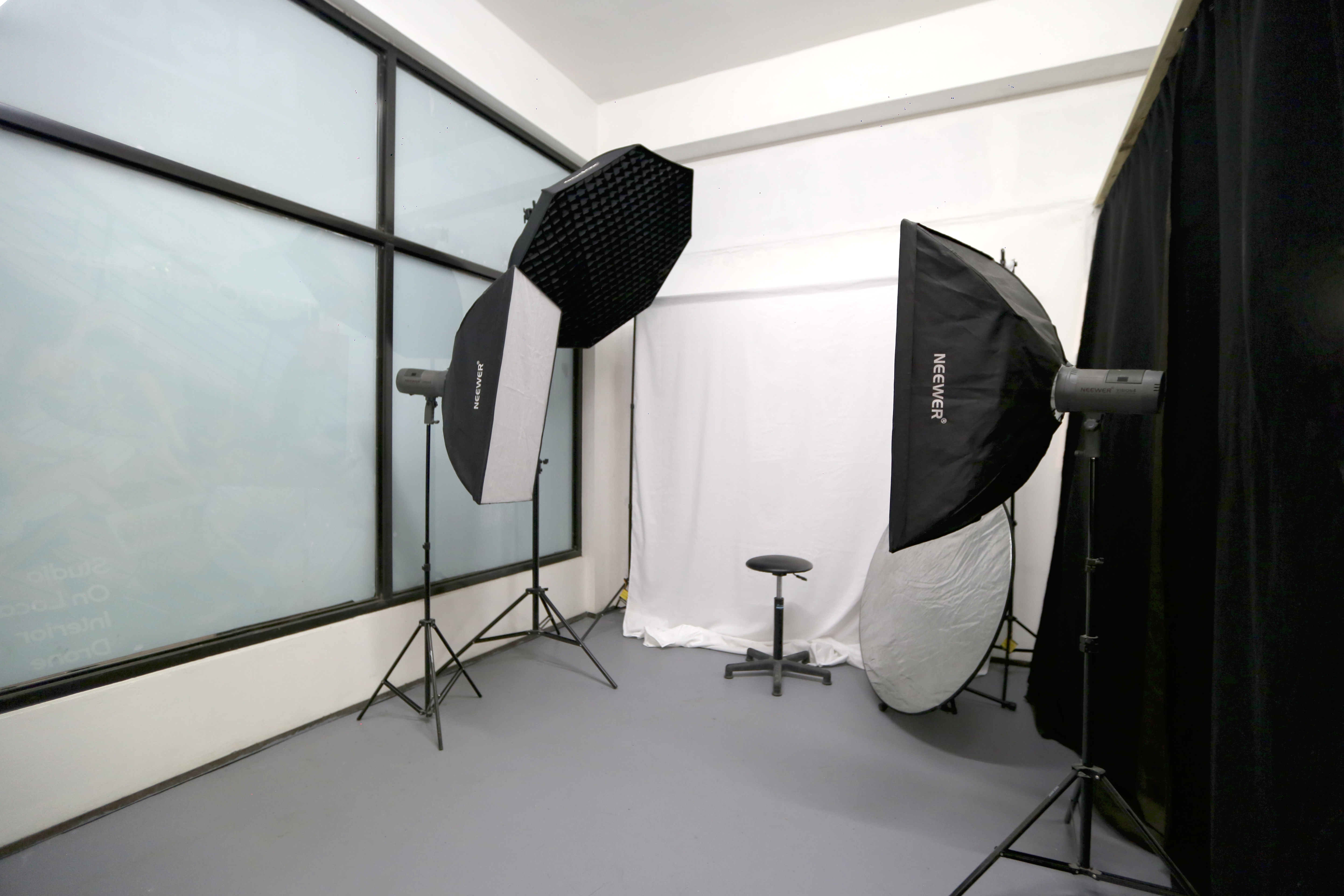Uptic Photo Studio lighting setup inside NSC Negril