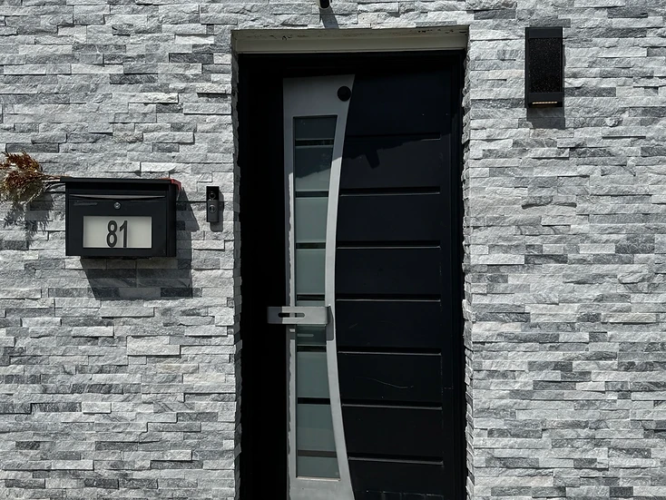 Notify Technologies video doorbell installation at modern residential entry