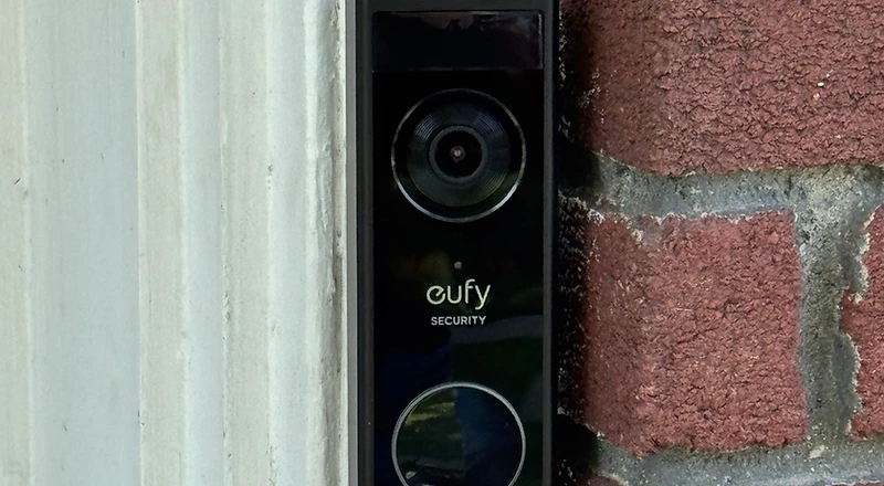 Eufy dual-lens video doorbell installed at residential entrance