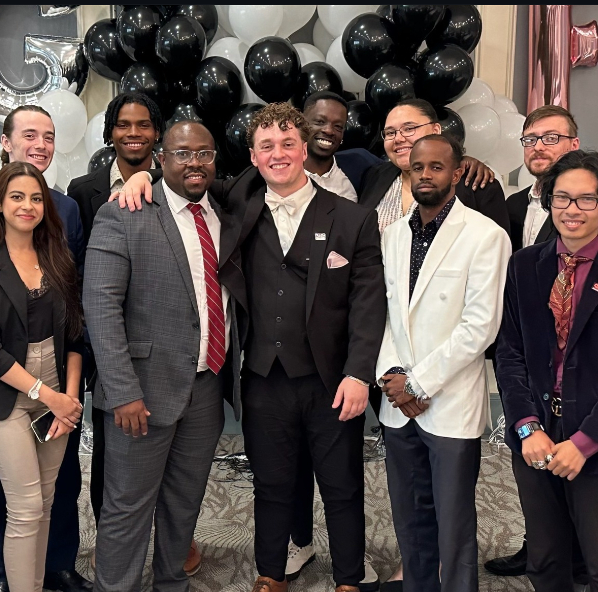 Alvin Day with colleagues at a professional event