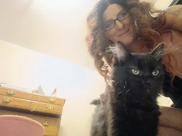 Nori (now Scratch), a rescued kitten now thriving in a loving home