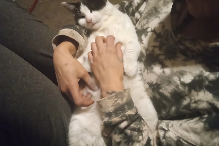Holding Scooter, relaxed and content
