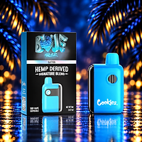 Cookies Blue Raz 5-g-Vape – Box und Gerät vor blauem Palmenhintergrund