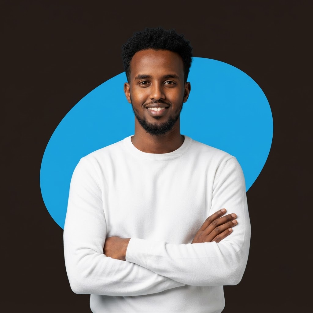 Young Somali man smiling in a white sweater