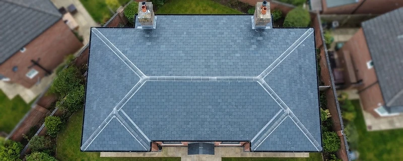 Aerial drone view of a residential slate roof