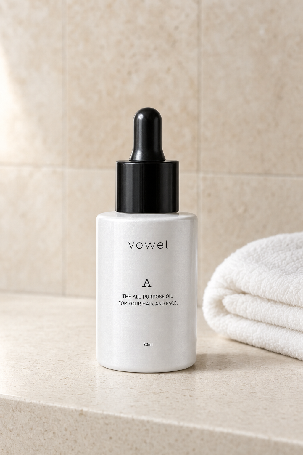 The vowel A bottle resting on a beige stone shelf against a tiled stone wall