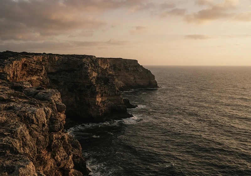 Algarve cliffs at sunset
