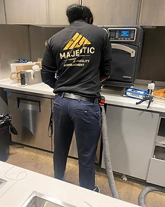 Majestic technician installing a TurboChef oven