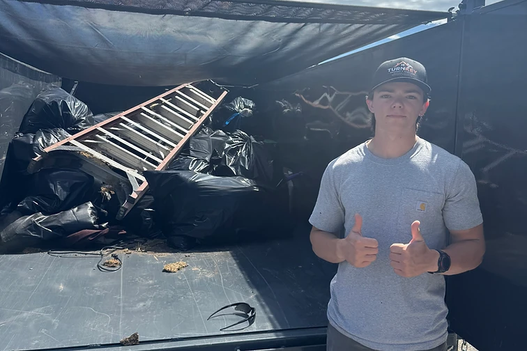 A loaded junk trailer after a completed cleanout